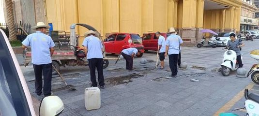 上高城管 烈日下的堅守 城市管理“不降溫”